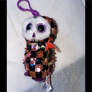 Ty owl keychain with reversible sequence